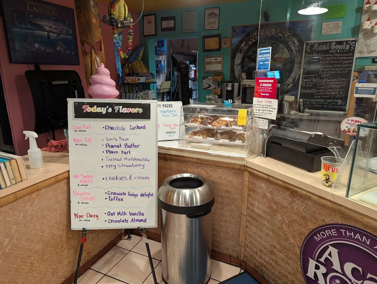 The hand-written Today's Flavors whiteboard at the Paradise Yogurt counter